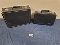 Two hard shell music cases