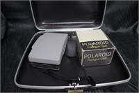Polaroid camera with flash and hard case