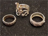 3 sterling rings:  2 bands with patterns