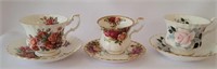 THREE ROYAL ALBERT CUPS AND SAUCERS