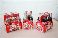 1999 Commemorative Coke A Cola Bottles,