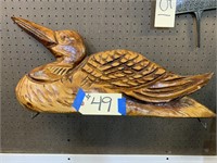 Large wood carved duck