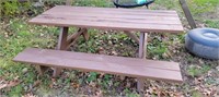 Brown wooden picnic table approx 6 foot long.
