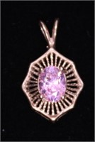 10 K GOLD WITH PINK TOPAZ PENDANT 2.7 GRAMS