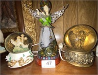 2 snowglobes and angel figurine