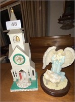 church and angel statues