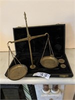 SET OF BOXED GOLD SCALES