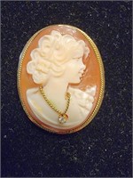 Cameo pin with 14k gold band.  Made in Italy.