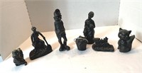 Statues Crafted from Coal