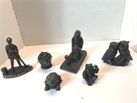 Statues Crafted from Coal