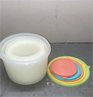 Tupperware storage bowls with lids