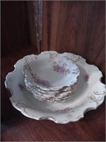 China serving bowl with set of 6 smaller bowls.