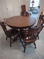 Round Kitchen table with 4 padded chairs and