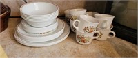 Corelle dish set. Service for four with some