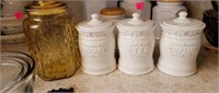 Group of 3 white canister and 1 yellow glass