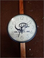 Carter oil supply clock. 9in