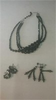 Black bead necklace and two pair of black bead