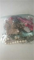 Bag of miscellaneous jewelry and parts