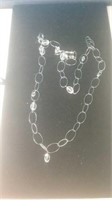 Silvertone loop necklace with clear beads