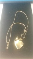 Gold tone chain with modern heart-shaped pendant