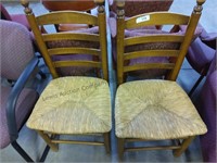 2 ladder back chairs woven bottoms