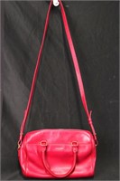 Yves St-Laurent Pink Baby Duffle Bag