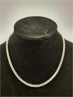 Heavy chain rope style sterling silver necklace.