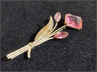 Sterling brooch flower w/stones. Total weight 14g.