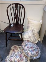 Wooden chair and throw pillows