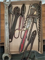Pipe wrench,  tin snips, pliers and more