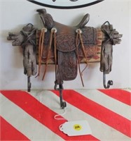 Cast Iron Saddle on Fence Coat Hanger