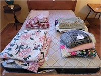 AFGANS; SHEETS; BEDSPREADS ON TOP OF BED