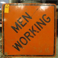 MEN WORKING SIGN