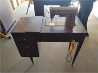 Singer Sewing Machine in Sewing Cabinet