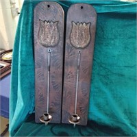 A pair of wall sconce candle holders