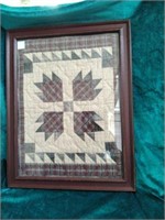 Framed quilt piece