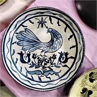 2 round pottery decorative plates