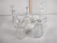 5 clear glass cruets mismatched  stoppers