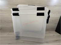 2 totes with lids and wheels both totes have