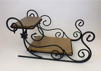 Wrought  iron sleigh with wood crafts shelves