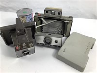 2 caméras Polaroid: 320 et Zip