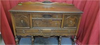 Ornate Antique Waltnut Buffet hutch
Matches