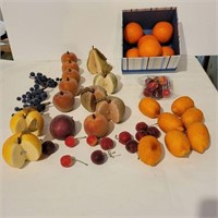 Various faux fruit