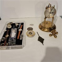 Various watches and clock pieces