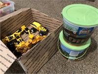 Box of construction toys and two buckets of play