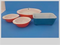 Three Pink One Blue Pyrex Dishes