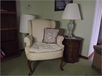 Wingback Chair, Round Side Table, Glass Lamp