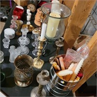 Various candles and holders