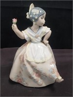 Lladro figurine of a girl in a dress