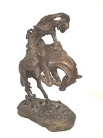 Bronze cowboy sculpture